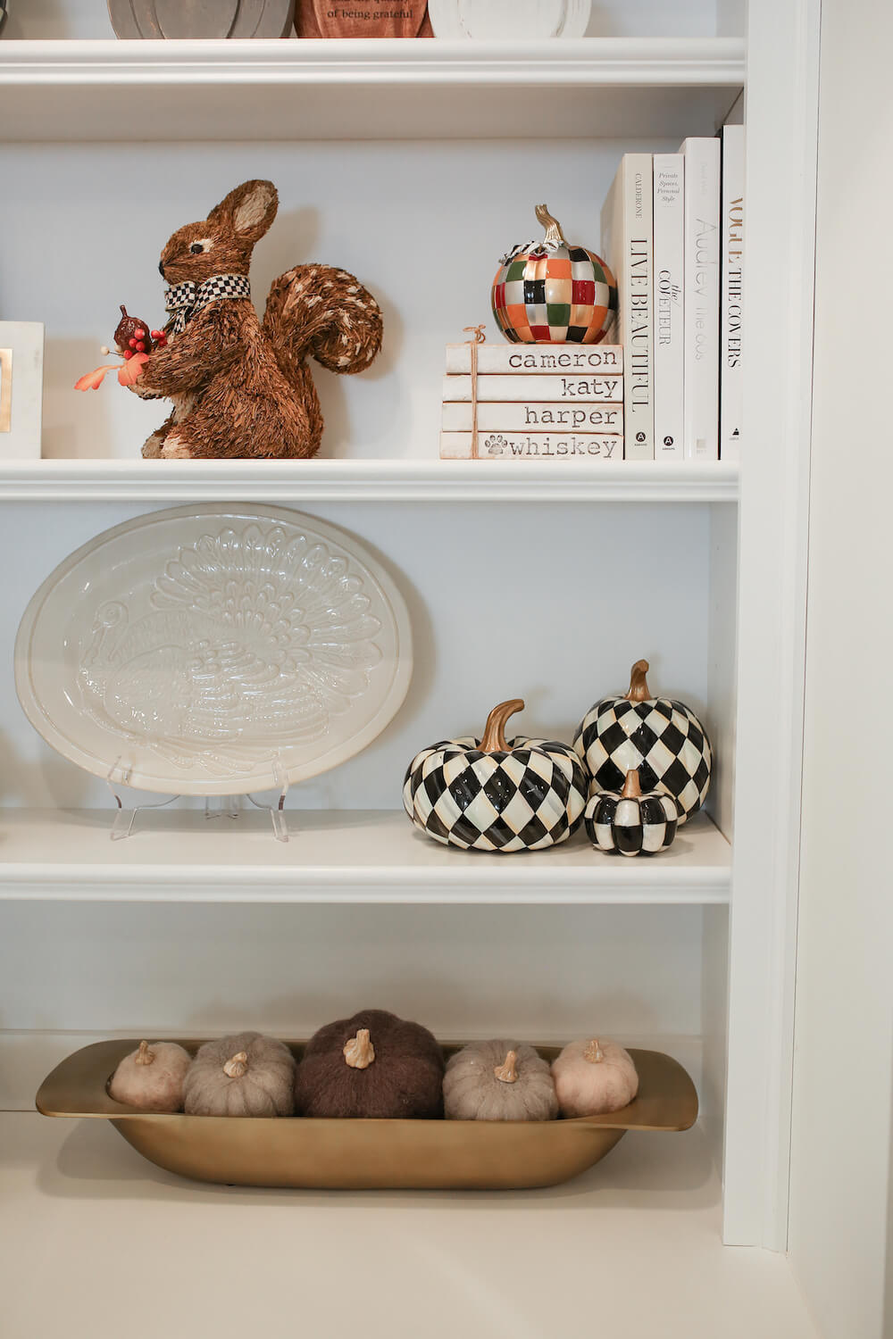 closeup of mackenzie childs pumpkins on